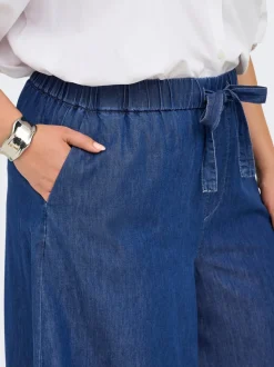 CARBEA Weiter Beinschnitt Jeans