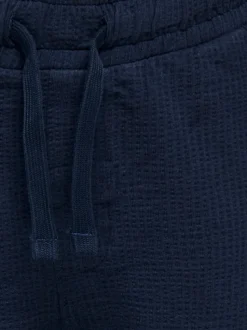 OSJKIAN Mid Rise Normal geschnitten Shorts